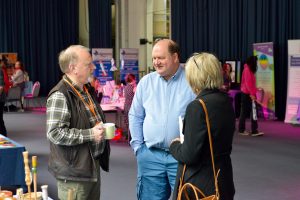 Young-Enterprise-David-Graham-left-chatting-to-visitors-at-DiD17